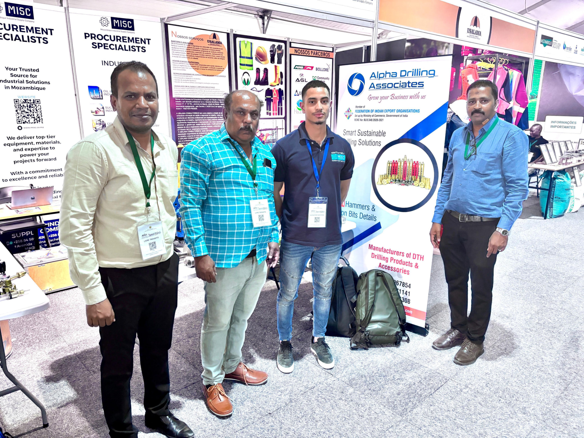 Alpha Drilling Associates representatives at an exhibition
